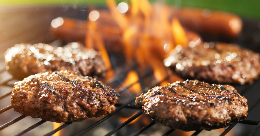 hamburgers and hot dogs on grill