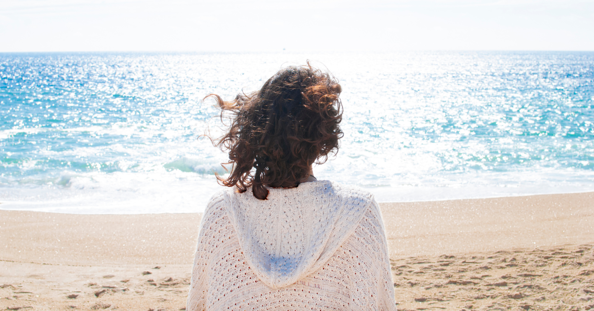 woman standing on beach